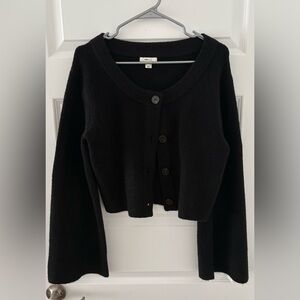 Black sweater vest with button
